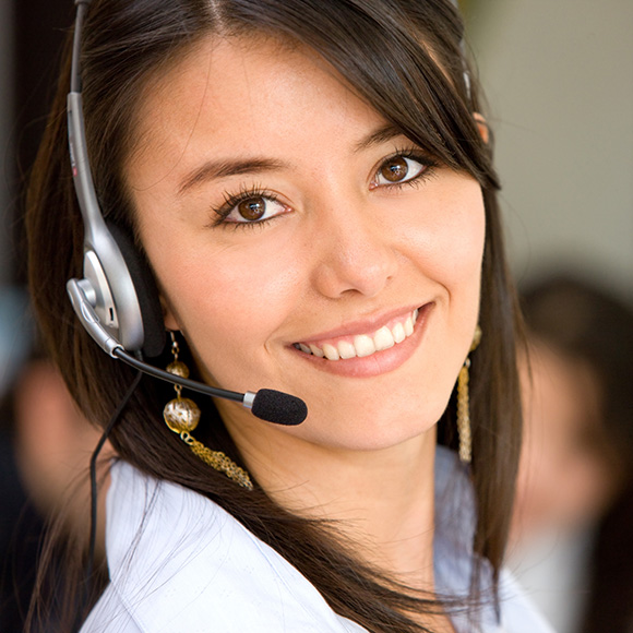woman with headset that has a microphone ready for business